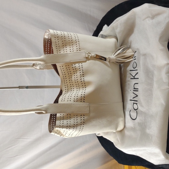 Calvin Klein Ivory Tote w/Tassel & Perforated Design - Picture 2 of 16
